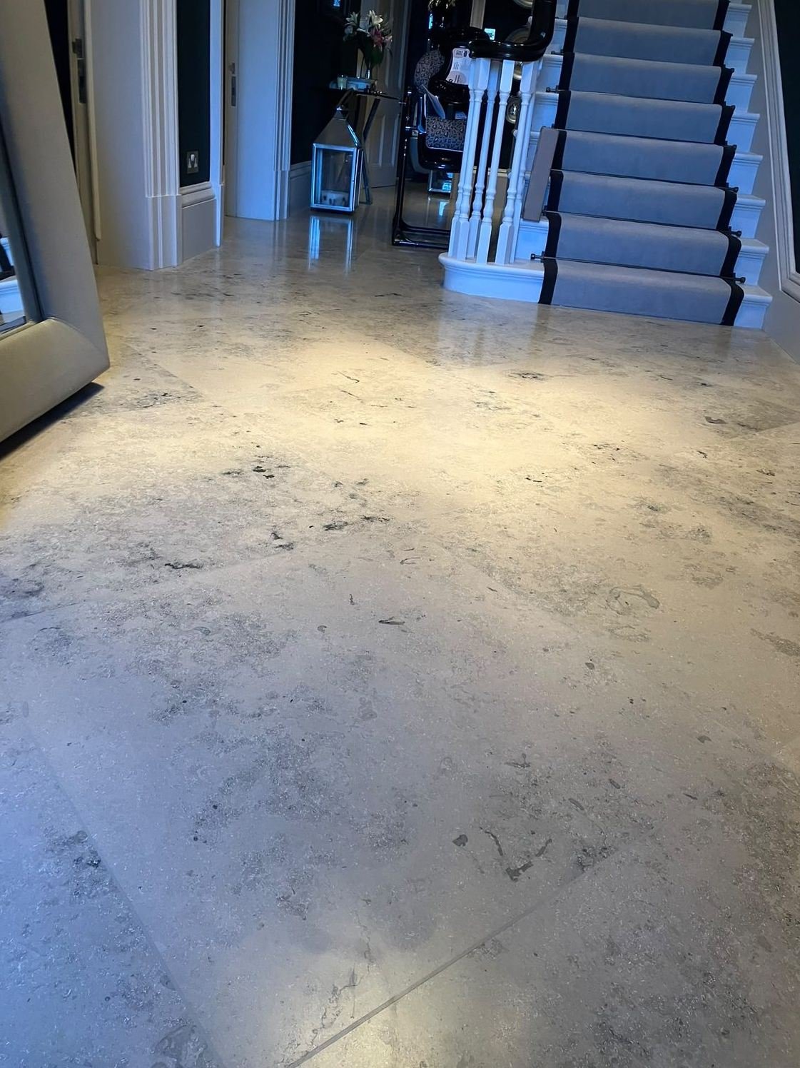 Polished limestone hallway floor restored in a Leeds home